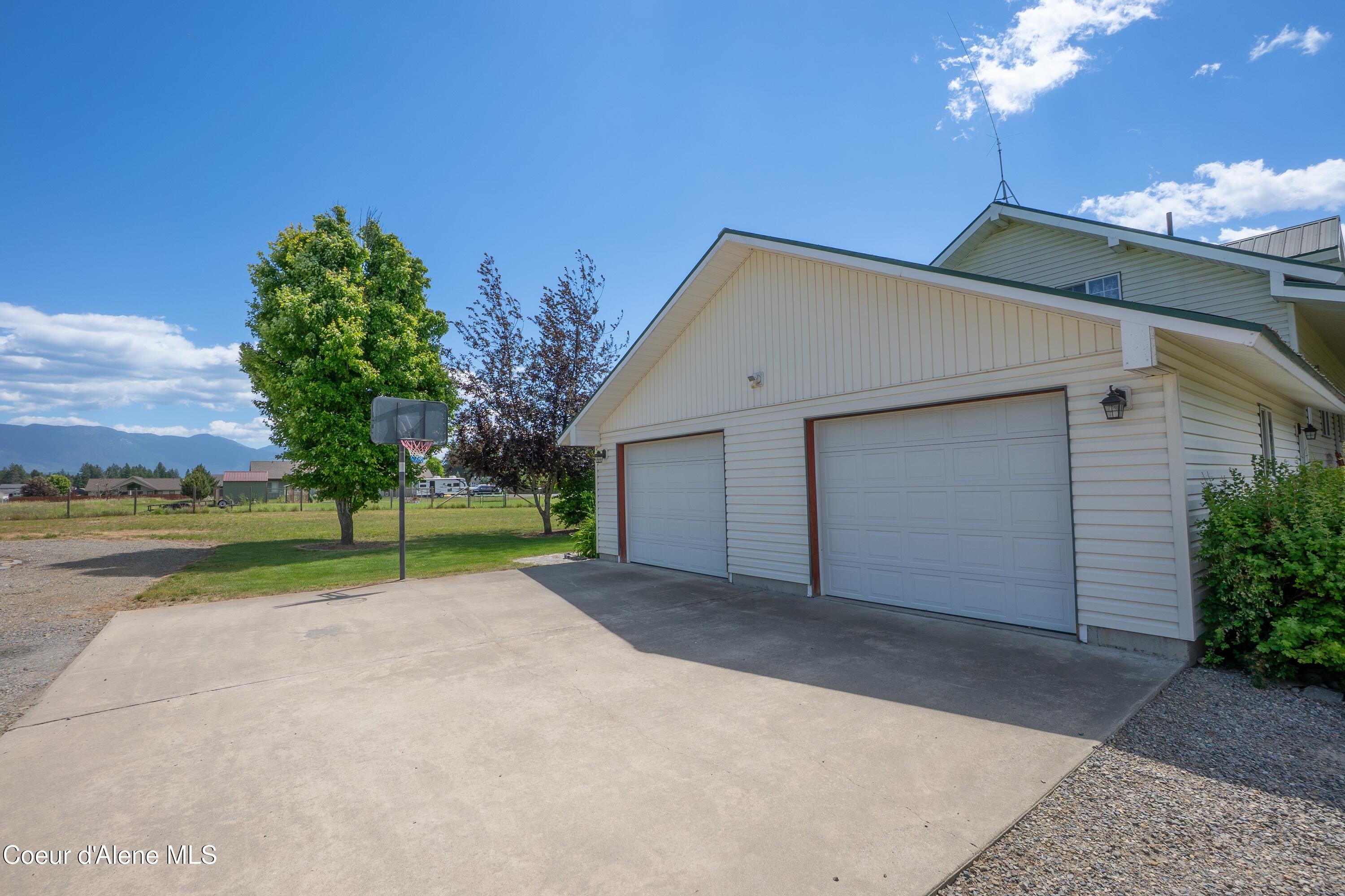 101 Zimmerman Road Moyie Springs, ID 83845 - Photo 29 of 39 Paved Garage Apron