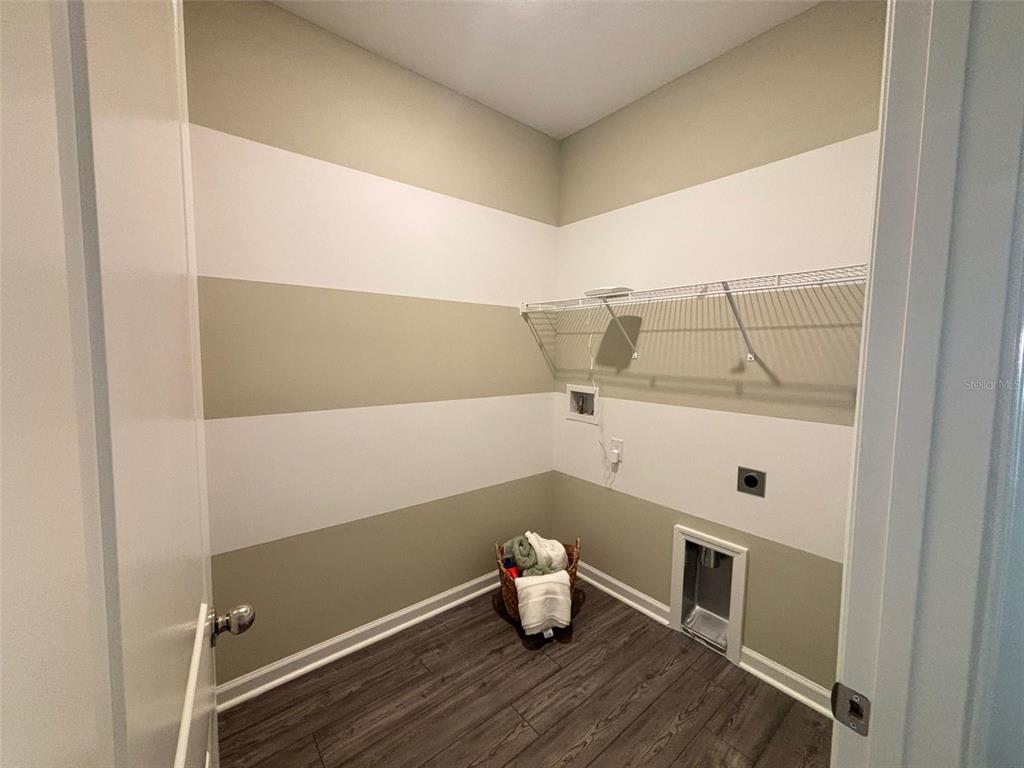 4738 Southwest 83rd Loop Ocala, FL 34476 - Photo 7 of 17 a room with storage and utility