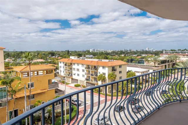 a view of a balcony with city view