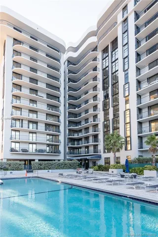a house view with a swimming pool