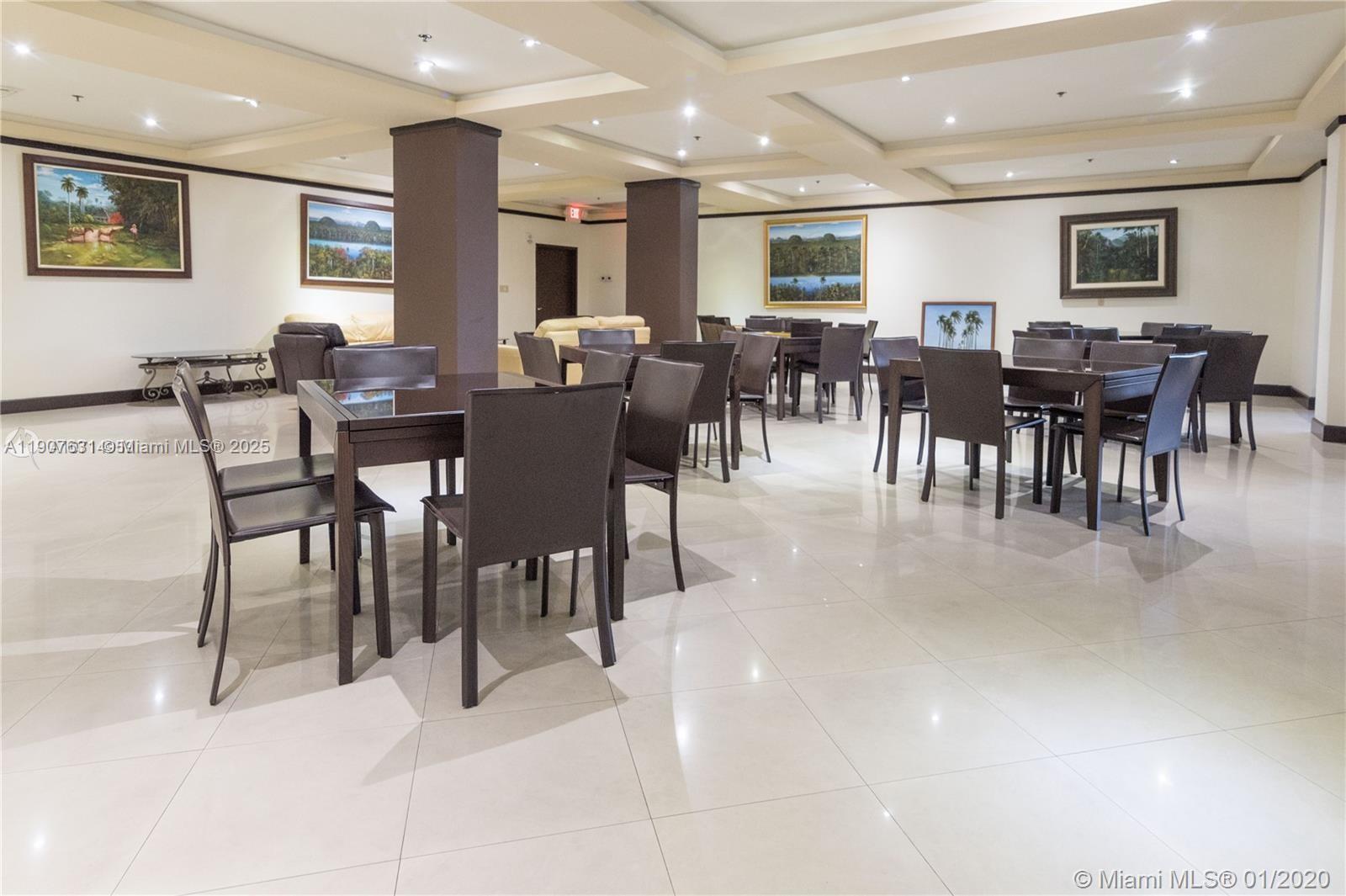 8877 Collins Avenue, Unit 604 Surfside, FL 33154 - Photo 20 of 25 a view of a dining area with furniture
