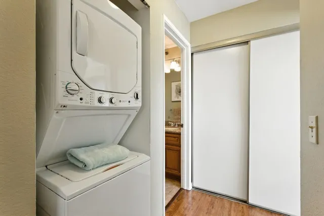 a bathroom with a toilet a sink and a mirror