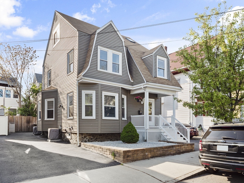 a front view of a house with street