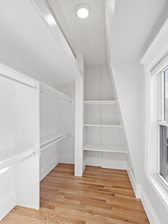 30 Baker Road Everett, MA 02149 - Photo 26 of 42 a view of an empty room with wooden floor and entryway