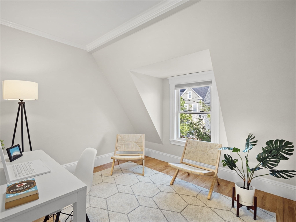 30 Baker Road Everett, MA 02149 - Photo 30 of 42 a living room with furniture and a window