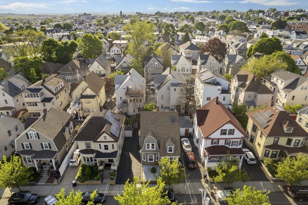 30 Baker Road Everett, MA 02149 - Photo 3 of 42 an aerial view of residential houses with outdoor space