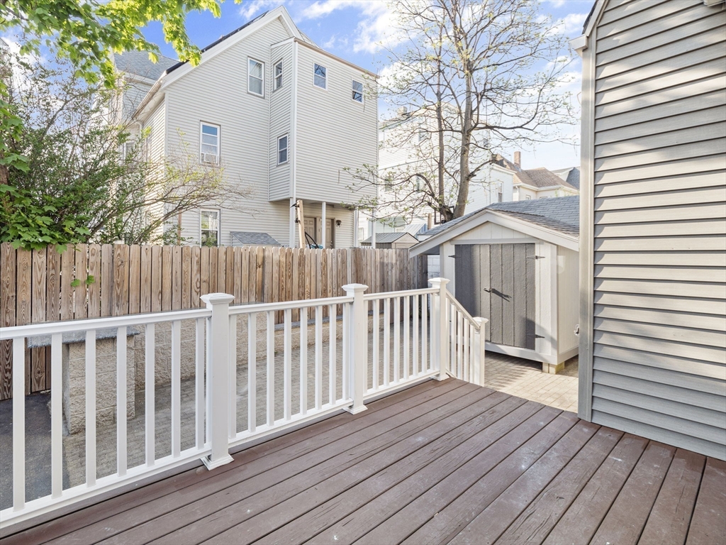 30 Baker Road Everett, MA 02149 - Photo 37 of 42 a view of a house with wooden floor