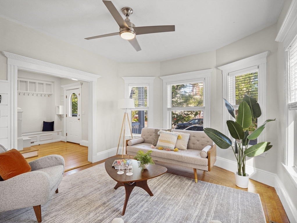 30 Baker Road Everett, MA 02149 - Photo 8 of 42 a living room with furniture and a wooden floor