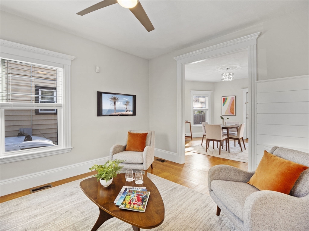 30 Baker Road Everett, MA 02149 - Photo 10 of 42 a living room with furniture and a wooden floor