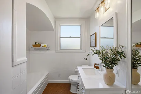 a bathroom with a sink and toilet