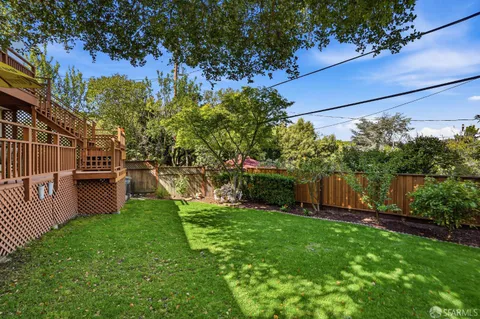 a view of a backyard with a garden