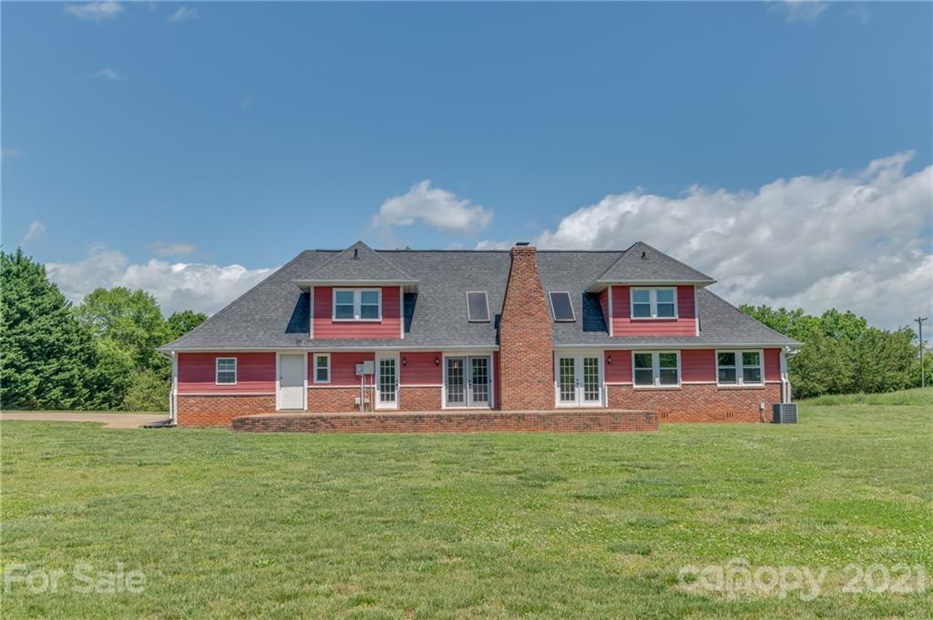 606 Old Stonecutter Road Rutherfordton, NC 28139 - Photo 2 of 48 a front view of residential houses with yard and outdoor space