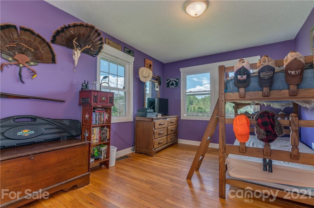 606 Old Stonecutter Road Rutherfordton, NC 28139 - Photo 12 of 48 a room with musical instruments
