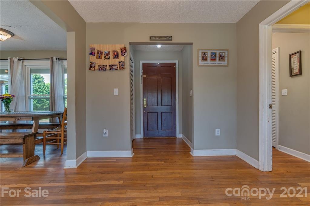 606 Old Stonecutter Road Rutherfordton, NC 28139 - Photo 13 of 48 a view of livingroom with hardwood floor and a living room
