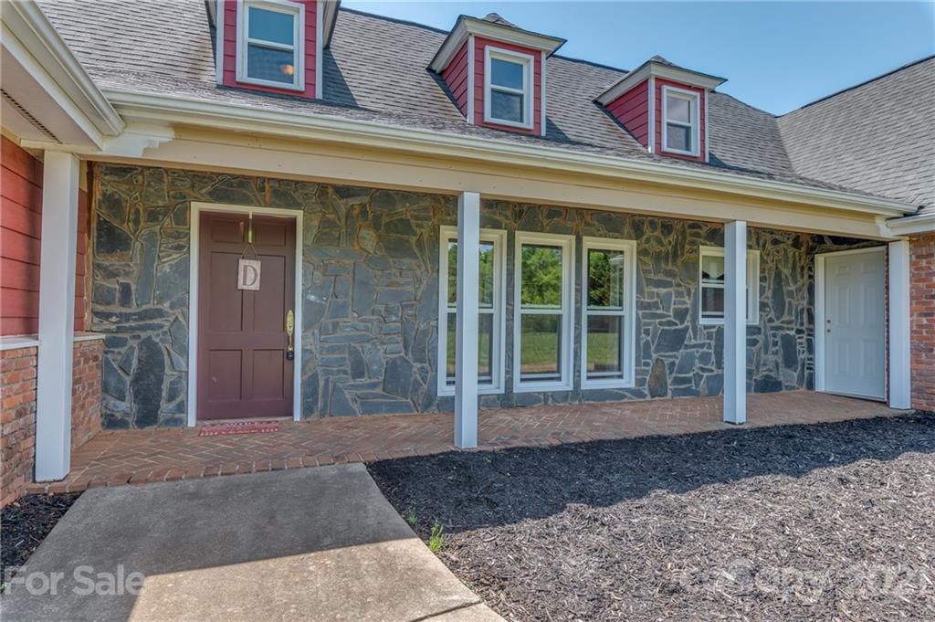 606 Old Stonecutter Road Rutherfordton, NC 28139 - Photo 3 of 48 front view of a building