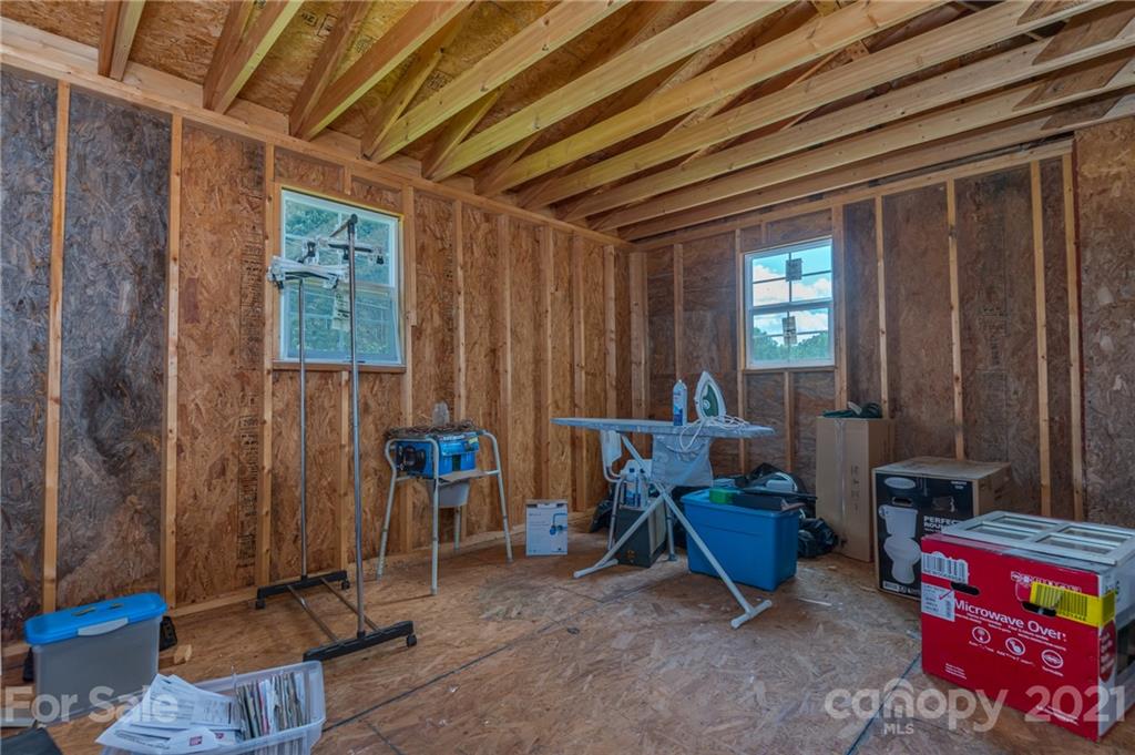 606 Old Stonecutter Road Rutherfordton, NC 28139 - Photo 22 of 48 a living room with furniture and a window