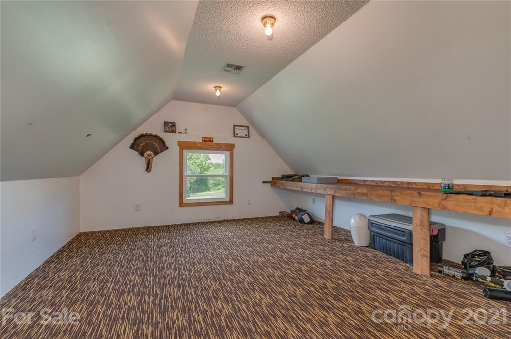 606 Old Stonecutter Road Rutherfordton, NC 28139 - Photo 27 of 48 an empty room with windows