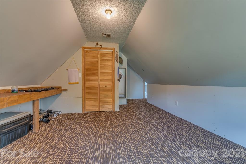 606 Old Stonecutter Road Rutherfordton, NC 28139 - Photo 28 of 48 a view of an empty room with a window