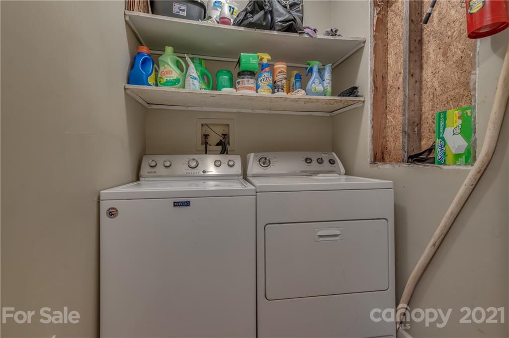 606 Old Stonecutter Road Rutherfordton, NC 28139 - Photo 33 of 48 a utility room with dryer and washer