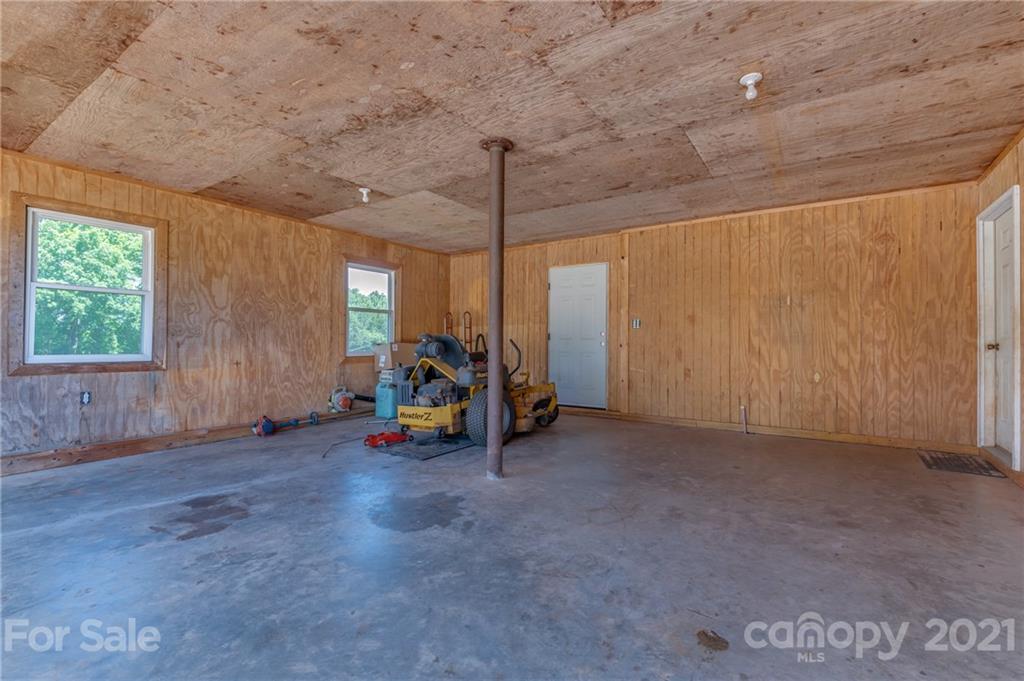 606 Old Stonecutter Road Rutherfordton, NC 28139 - Photo 35 of 48 a view of a room with gym equipment