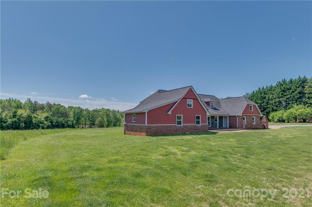 606 Old Stonecutter Road Rutherfordton, NC 28139 - Photo 36 of 48 a view of a house with a big yard