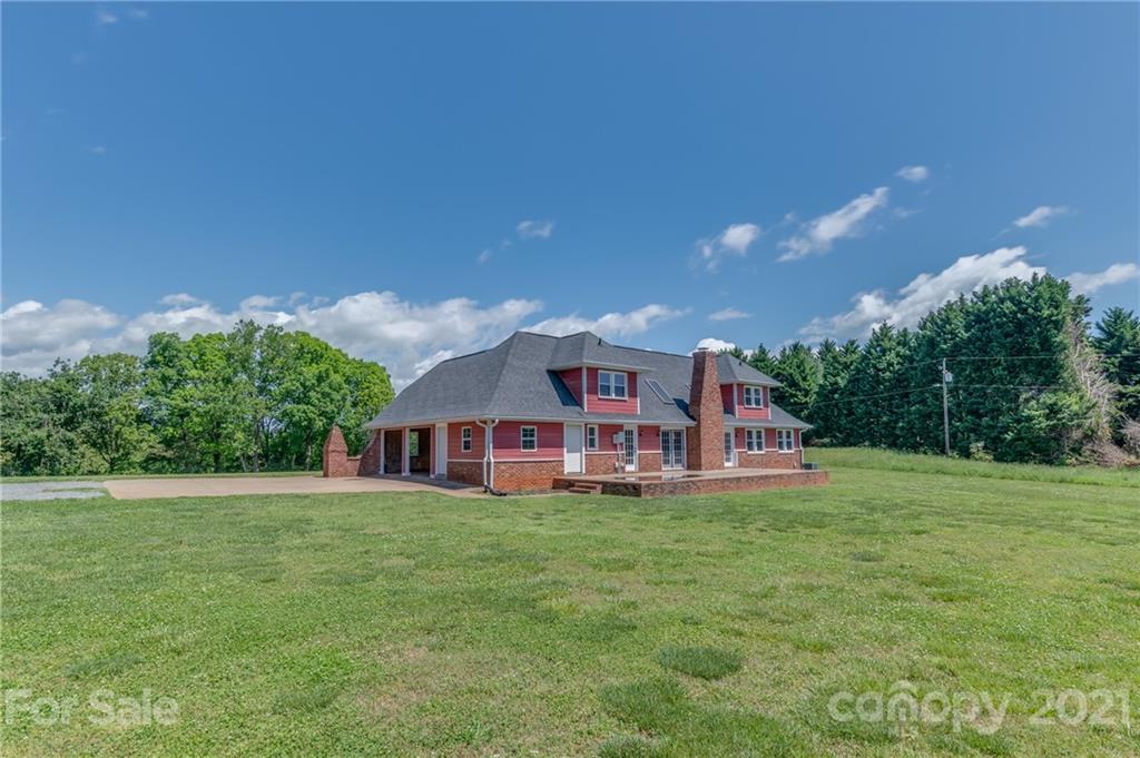 606 Old Stonecutter Road Rutherfordton, NC 28139 - Photo 39 of 48 a view of a house with a big yard