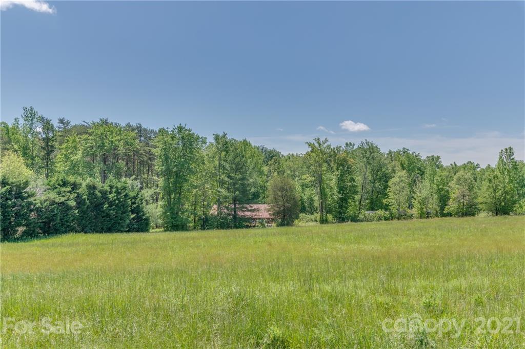 606 Old Stonecutter Road Rutherfordton, NC 28139 - Photo 42 of 48 a view of a grassy field