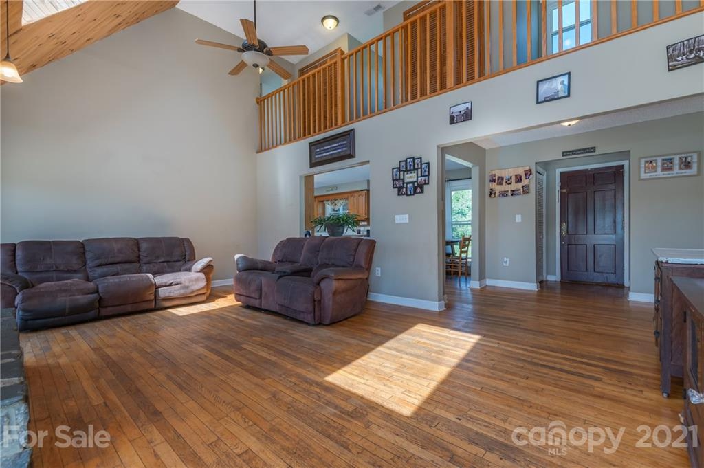 606 Old Stonecutter Road Rutherfordton, NC 28139 - Photo 7 of 48 a living room with furniture and a rug