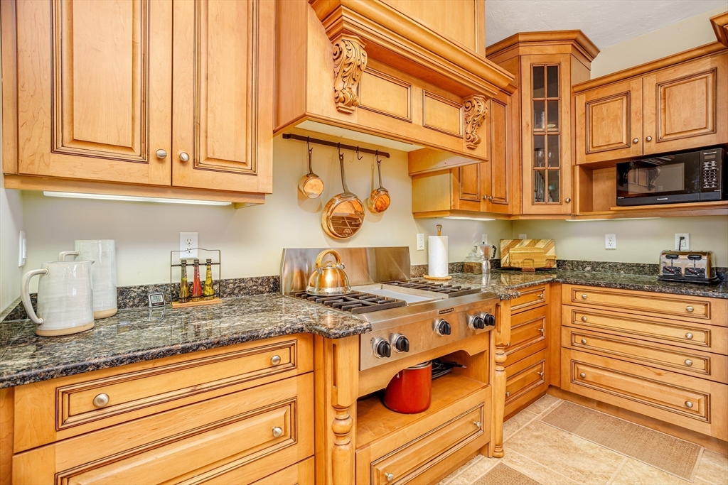 837 Mt Elam Road Fitchburg, MA 01420 - Photo 16 of 42 a kitchen with stainless steel appliances granite countertop a sink and cabinets