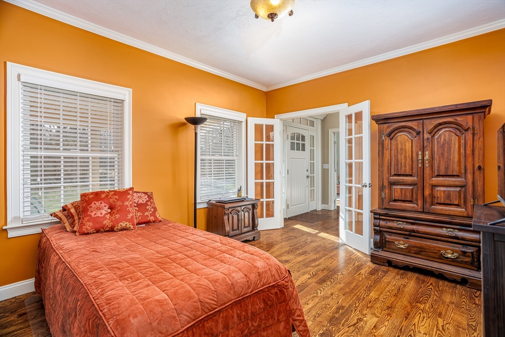 837 Mt Elam Road Fitchburg, MA 01420 - Photo 17 of 42 a bedroom with bed and wooden floor