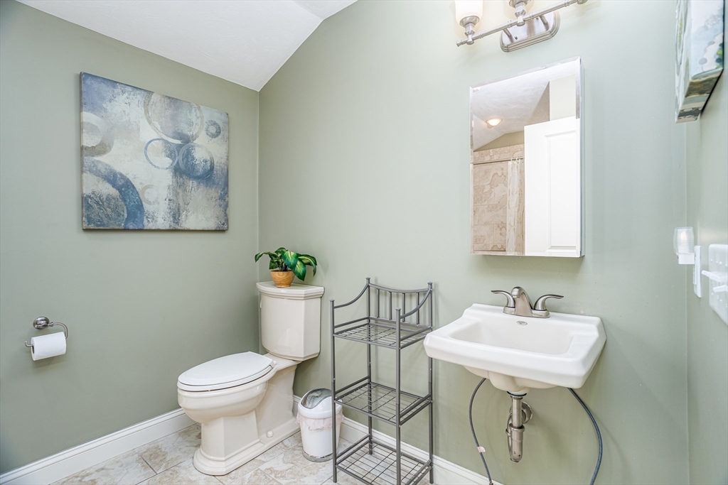 837 Mt Elam Road Fitchburg, MA 01420 - Photo 19 of 42 a bathroom with a toilet a sink and mirror