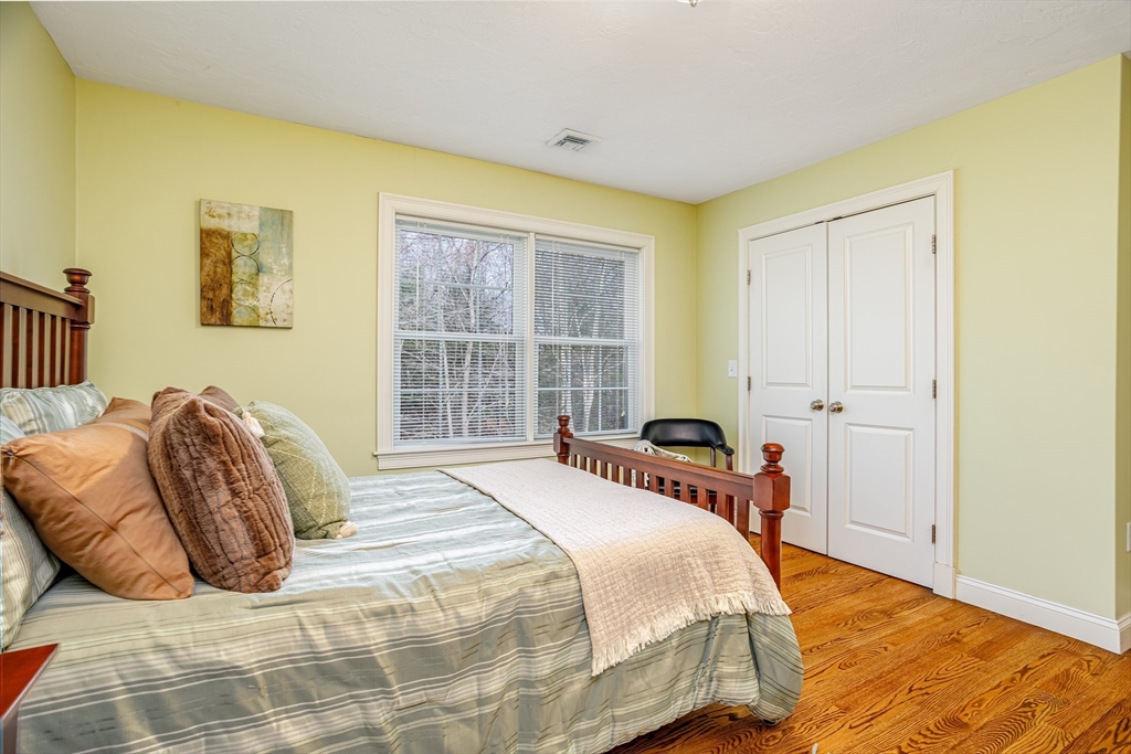 837 Mt Elam Road Fitchburg, MA 01420 - Photo 35 of 42 a bedroom with a bed and a window