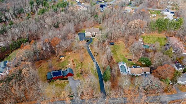 a view of a houses with a yard