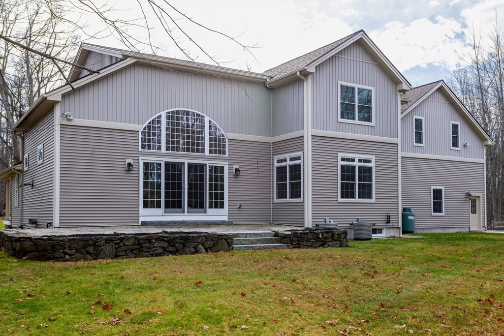 837 Mt Elam Road Fitchburg, MA 01420 - Photo 6 of 42 a front view of a house with a yard