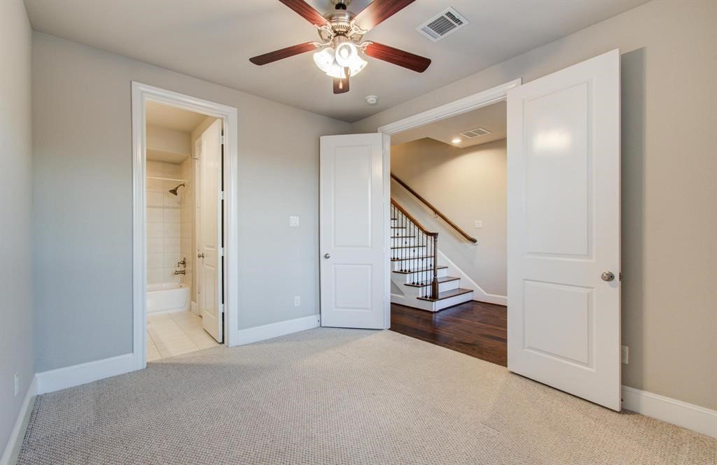 610 Delano Street Houston, TX 77003 - Photo 4 of 36 a view of an empty room and a ceiling fan