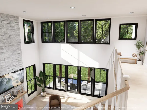 a living room with fireplace furniture and a large window