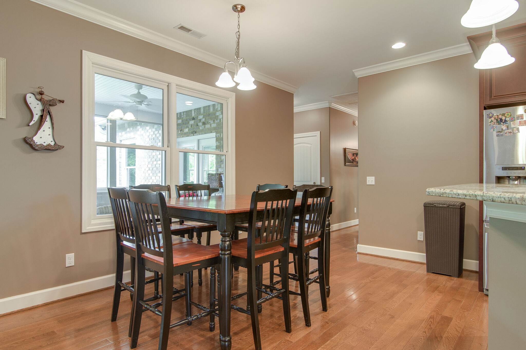 5125 Old Harding Road Franklin, TN 37064 - Photo 14 of 50 a view of a dining room with furniture window and wooden floor
