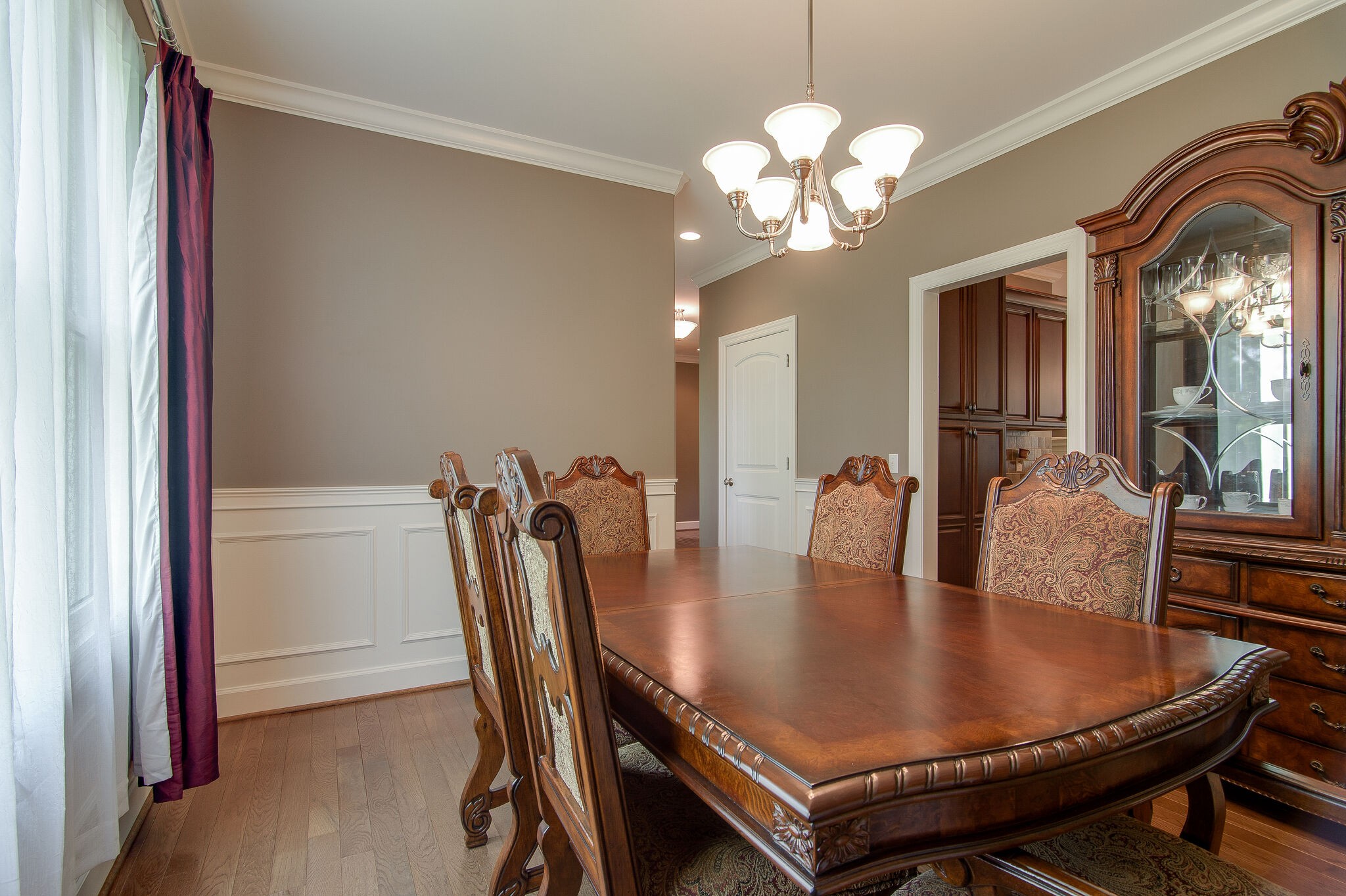 5125 Old Harding Road Franklin, TN 37064 - Photo 18 of 50 a dining room with furniture and chandelier