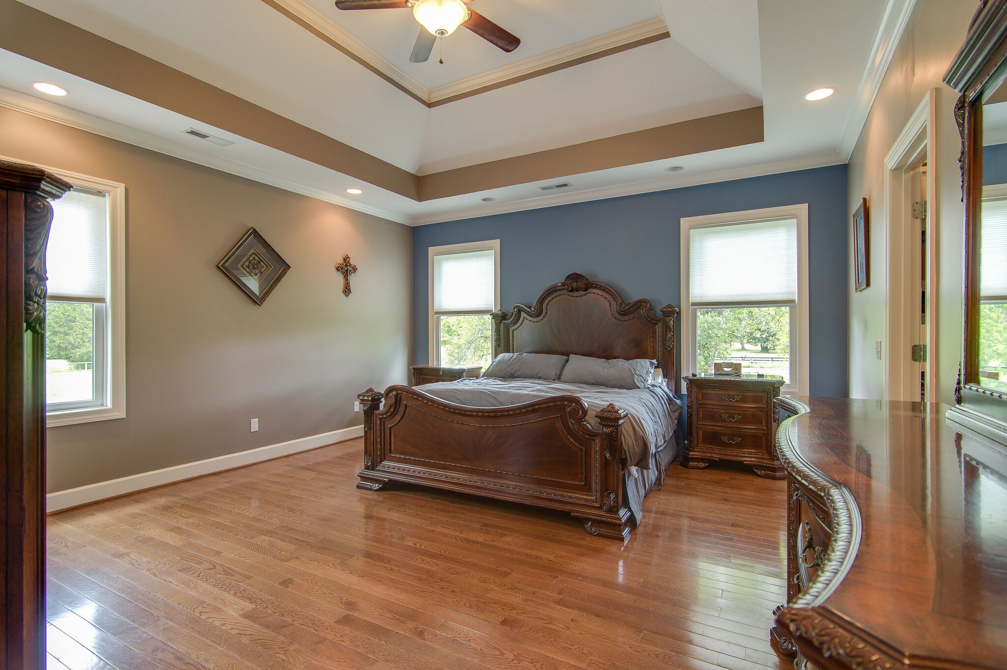 5125 Old Harding Road Franklin, TN 37064 - Photo 27 of 50 a bedroom with a bed and wooden floor