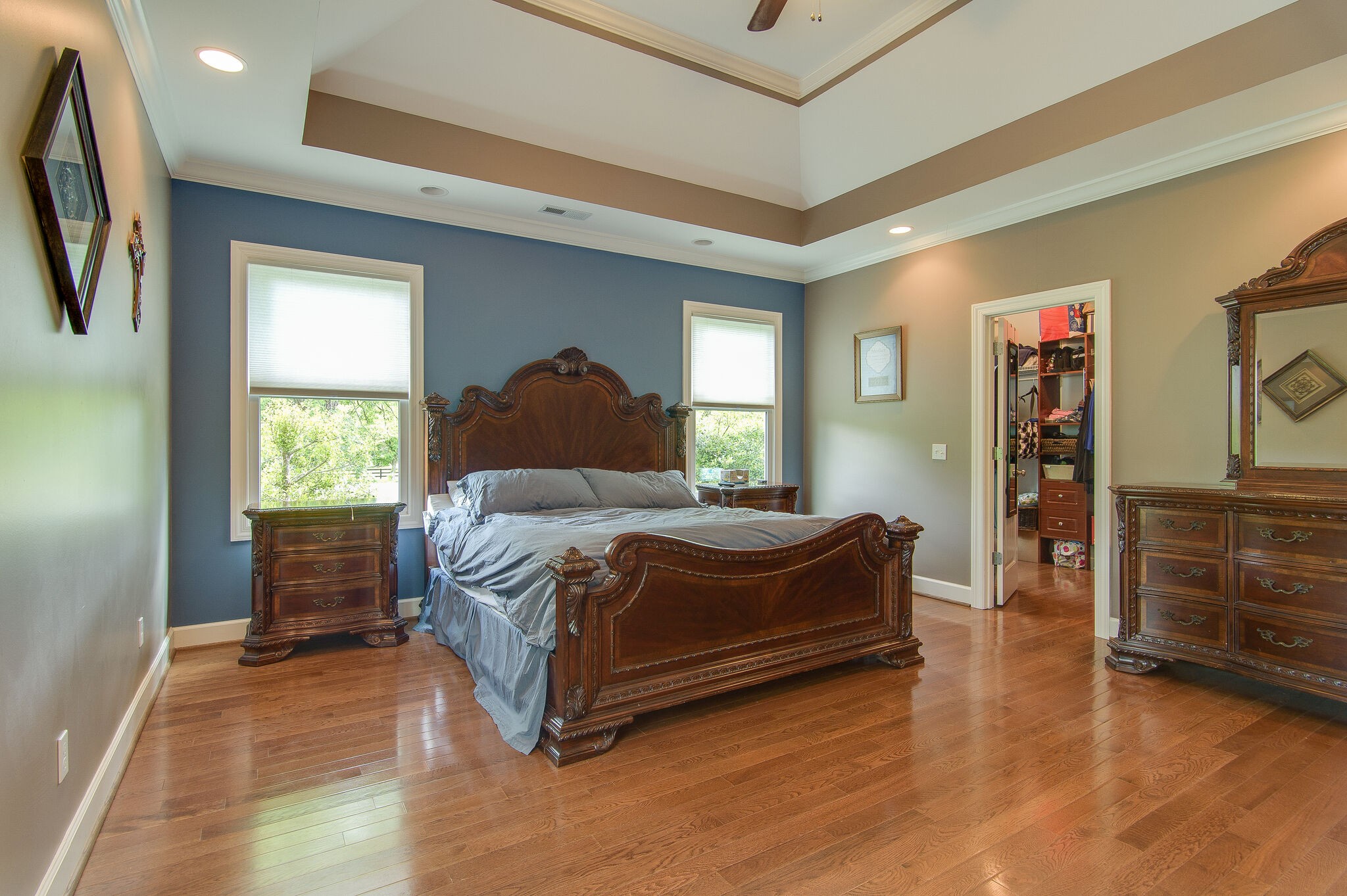 5125 Old Harding Road Franklin, TN 37064 - Photo 28 of 50 a bed sitting in a spacious bedroom next to a window