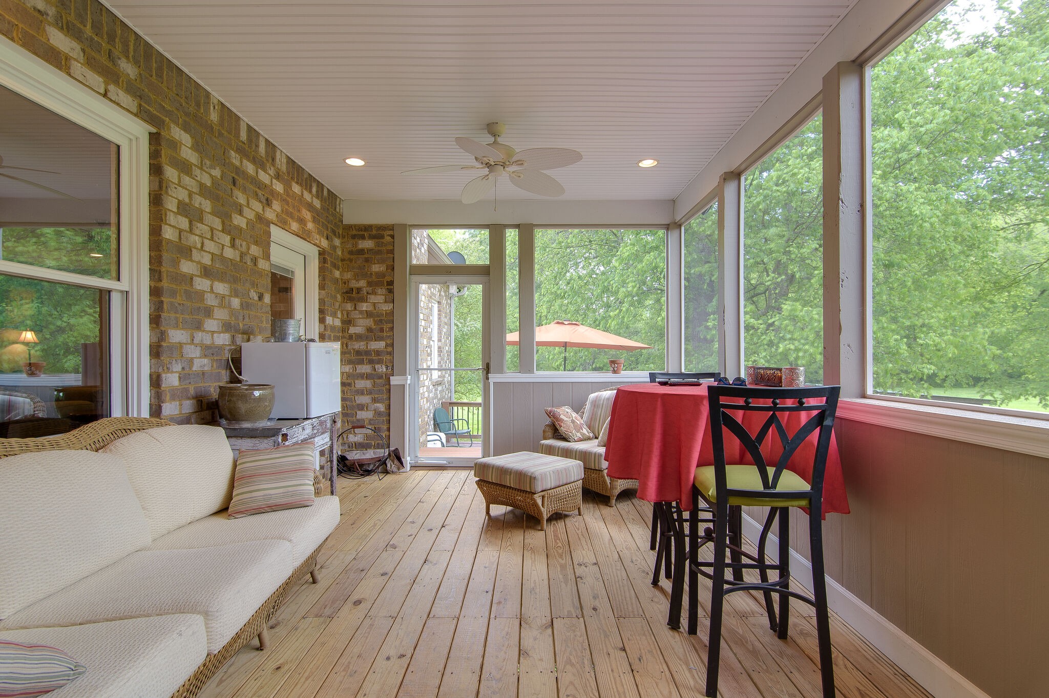 5125 Old Harding Road Franklin, TN 37064 - Photo 34 of 50 a living room with furniture and floor to ceiling windows
