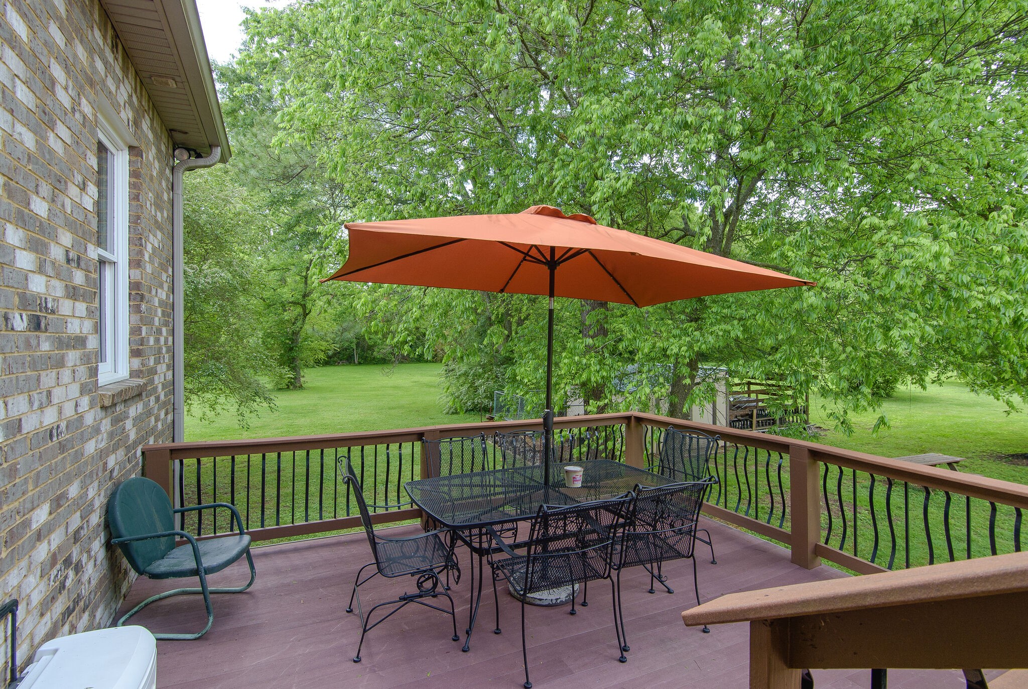 5125 Old Harding Road Franklin, TN 37064 - Photo 36 of 50 a view of a chair and table on the deck