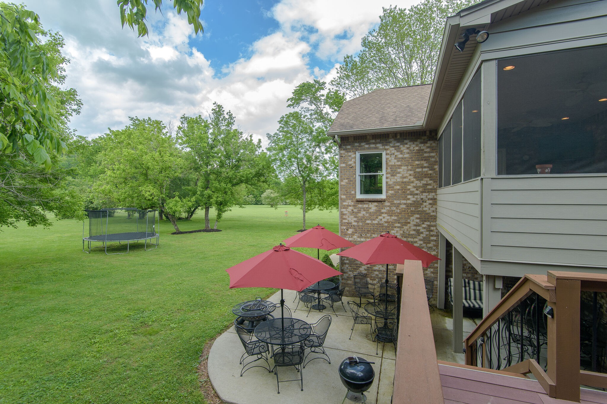 5125 Old Harding Road Franklin, TN 37064 - Photo 37 of 50 a view of a yard with furniture and a garden