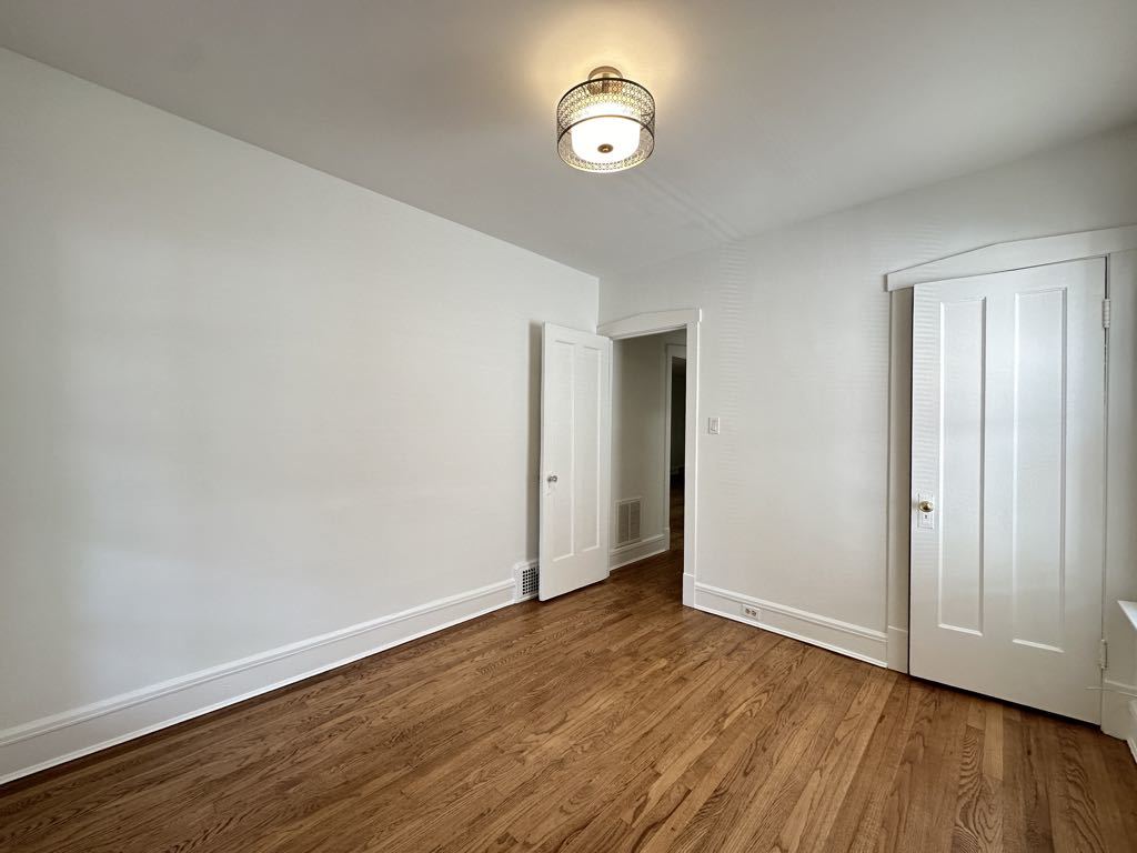 5701 North Keystone Avenue, Unit 1 Chicago, IL 60646 - Photo 17 of 20 a view of room with wooden floor