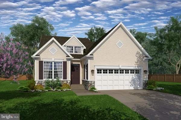 a view of house with yard and green space