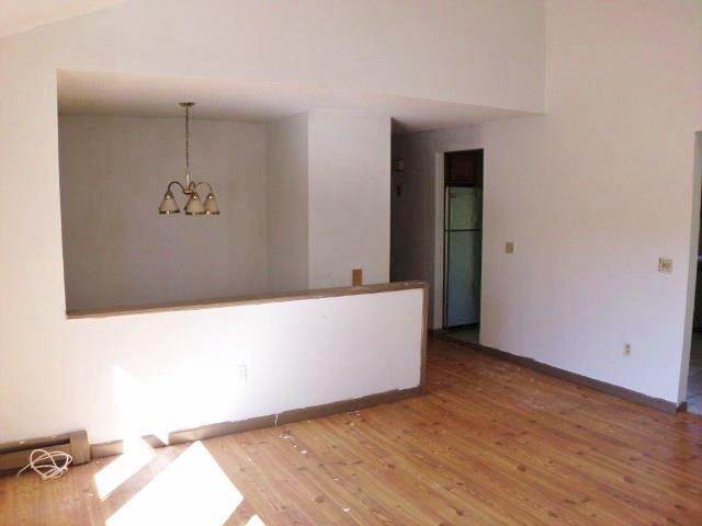 227 Charge Pond Road Wareham, MA 02571 - Photo 15 of 23 251-609466 - living room facing hall way