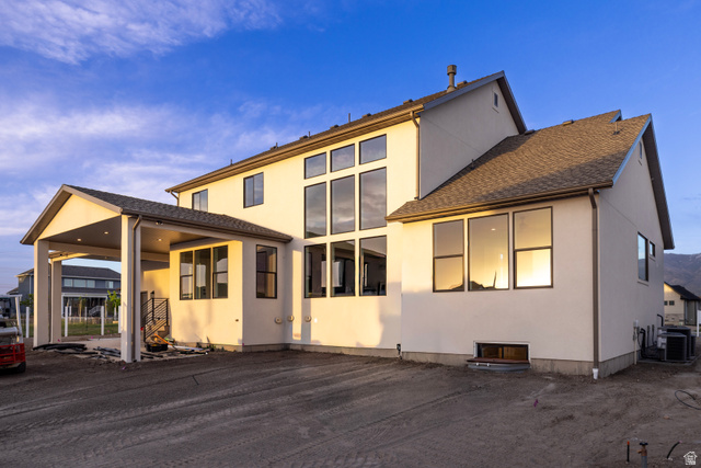 904 South 1900 West Layton, UT 84041 - Photo 4 of 19 Rear view of house with stucco siding and a patio area