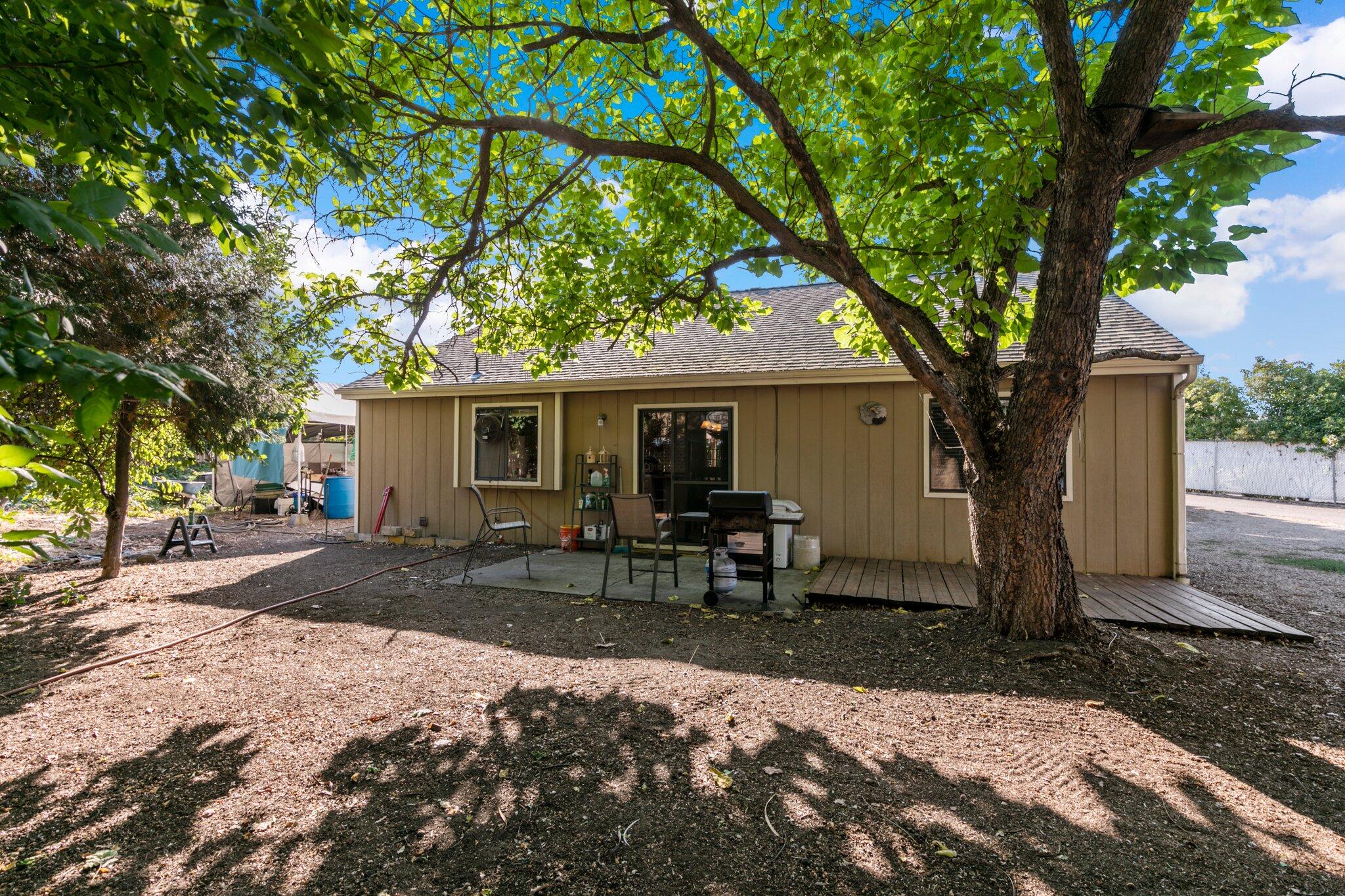 2592 Merriman Road Medford, OR 97501 - Photo 21 of 26 a front view of a house with yard and seating area