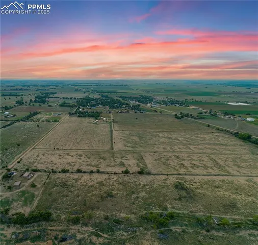 a view of a lake with a city