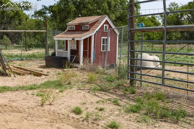 a kitchen with stainless steel appliances granite countertop a refrigerator and a stove
